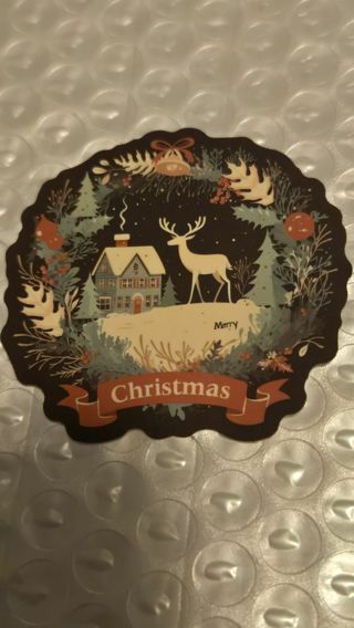 Deer beside a house Christmas Sticker