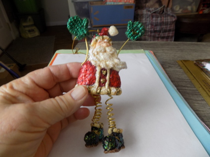 Vintage 6 inch tall Santa Ornament Has gold spring legs wire arms metallic red outfit