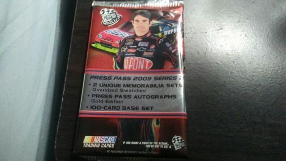 2009 PRESSPASS/NASCAR RACING SEALED PACK TRADING CARDS. PACK HAS 6 CARDS.
