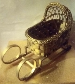 2 Woven golden sleighs