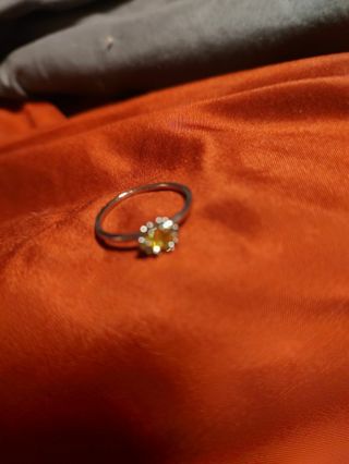 Pink ring size 7 silver tone yellow stone
