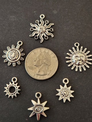 Six (6) Different SUN Charms