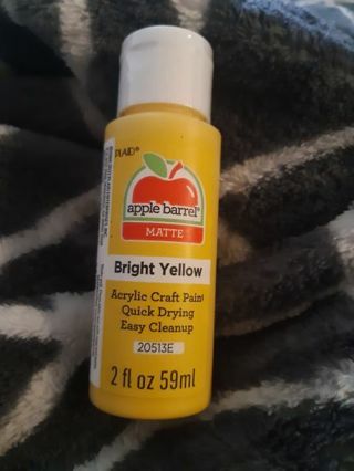 Bright yellow acrylic paint