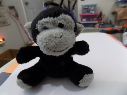 3 inch tall gray & black monkey plush