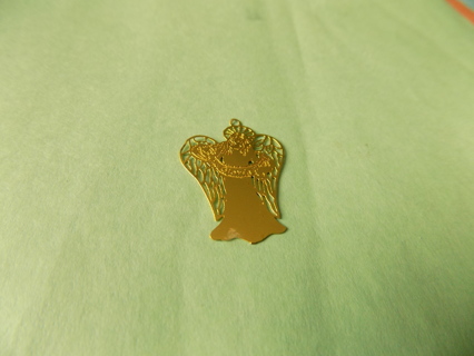 1 1/2 inch flat goldtone angel pendant charm with filigree wings Says Gloria on chest