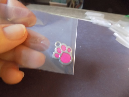 Hot pink enameled paw print charm # 2   1 inch