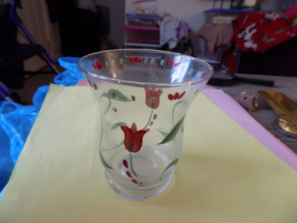 Clear glass tulip shape votive candle holder with tulip & leaves painted on it