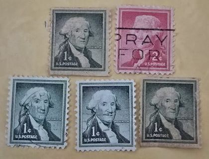 Four .01 and One .02 Used Postage Stamps