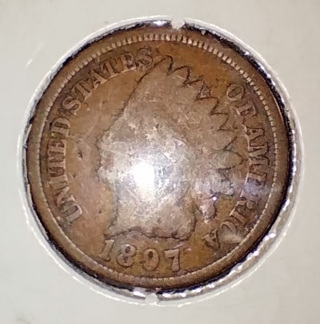 COIN 1997 INDIAN HEAD PENNY 127 YEARS OLD AND ALMOST A S OLD AS ME. GRAB THIS BEAUTY WHILE YOU CAN.