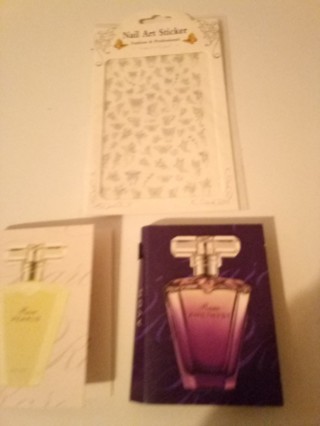 2 avon perfume samples and nail decorations!