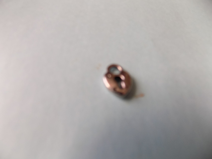 Small silvertone heart shape lock charm with keyhole