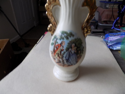 Vintage 6 inch tall bud vase Victorian Couple courting. lots of gold double handle, scallop rim