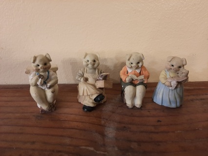 Four Cute Pig Figurines