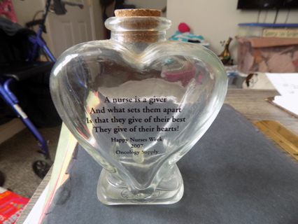 6 inch tall clear glass heart shaped corked vase 2007 Says Nurse is a giver