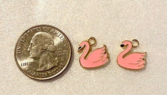2 pc pink enamel swans