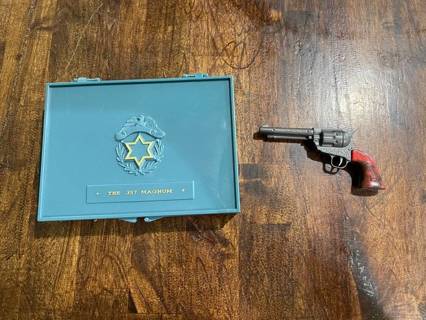 Vintage Miniature Colt 45 Toy Gun made in the United Kingdom Plus a Marx 357 Magnum Case