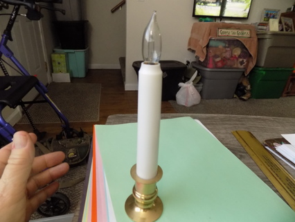 Battery operated single candle for in a window sill 8 1/2 tall 