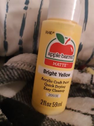 Bright yellow acrylic paint