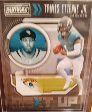 2021 PLAYBÒOK TRAVIS ETIENNE ROOKIE RC NEXT UP # NXT-TET JACKSONVILLE JAGUARS