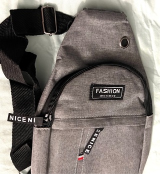 Brand New: Gray Fashion 10.5”x 7.5” Backpack w/ Two Great Zippered Pockets.