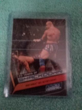 WWE smackdown Topps trading card of 20 years of smackdown Kurt angle defs Rey Mysterio from 2019