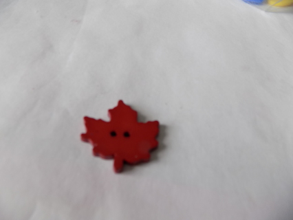 Large 1 1/2 inch plastic red Maple leaf button