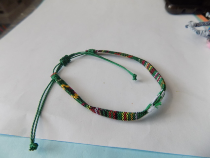 Bracelet woven thread green, yellow, and stripe