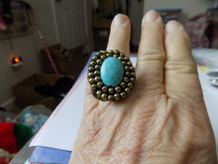 Adjustable cocktail ring turquoise oval stone 2 rows goldtone beads, on watchband band