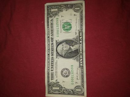 $1.00 dollar low serial number 00013259 in great shape circulated