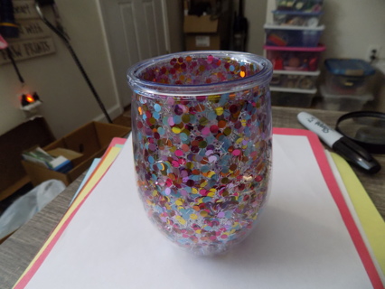 5 inch tall acrylic tumbler with embedded sparkles inside cup