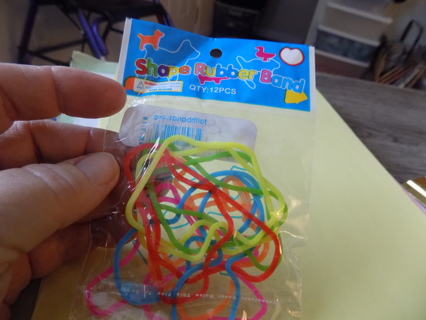 NIP pack of assort color and shapes 12 rubber bands Set # 2