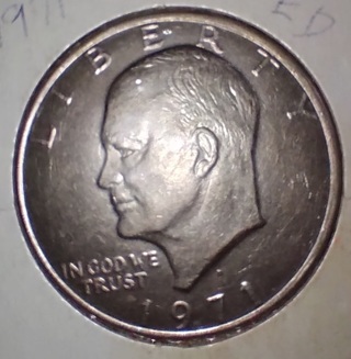 COIN 1971 D Eisenhower Dollar IN GOOD CONDITION SEE PHOTOS AND LETS START THIS AUCTION AT 99 POINTS.