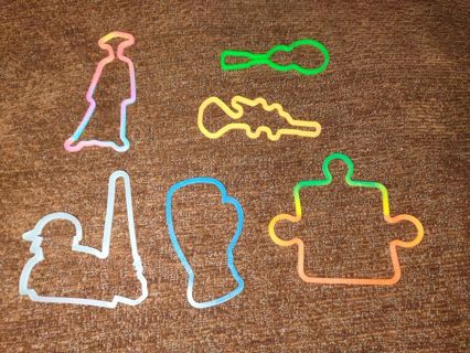 6 silly bandz rubber band bracelets, Baseball Player, guitar, puzzle , chinese man, trumpet,boxing