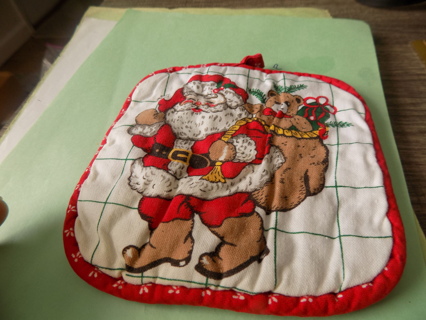 Christmas pot  holder red and white Santa and toy bag