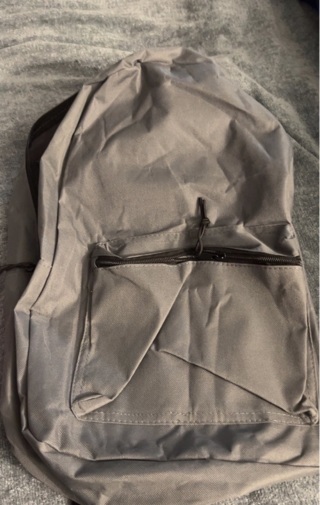 Brand New: 17” Gray and Black Backpack w/Padded Shoulder Straps. Great Zippered Pockets