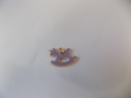 Enamel purple rocking horse charm