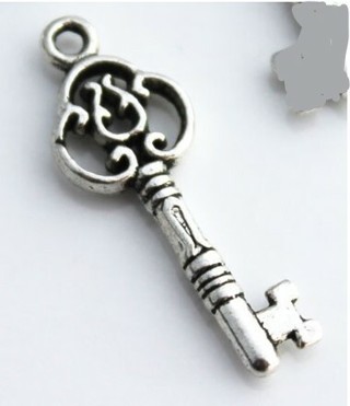 Silver decorative skeleton key charm