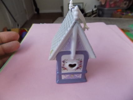 Porcelain 2 1/2 tall purple bird house ornament with white roof