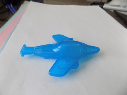 Blue plastic airplane shape whistle