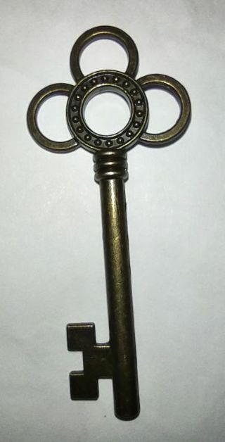 One coppertone long pendant key charm