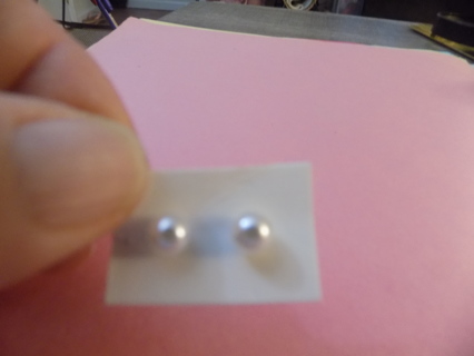 Single medium size pearl post earrings
