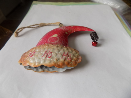 Vintage Metal 3D Santa hat ornament with spring and red bed at end of hat says HoHoHo on trim 5 inch