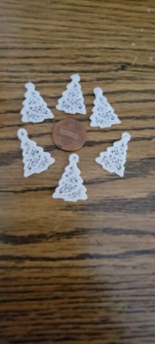 Mini white Christmas trees