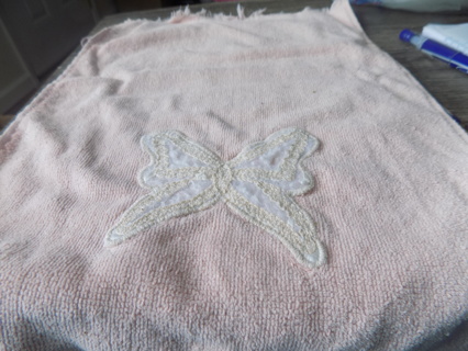 Light pink hand towel with butterfly applique