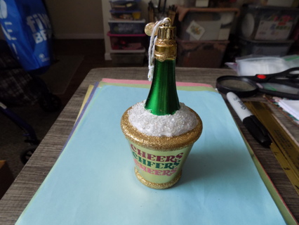 6 inch tall chilled green bottle of champagne ornament in ice bucket Says cheers