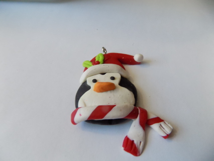 2 1/2 inch polymar clay  penguin ornament in Santa Hat and red, white scarf