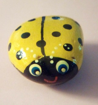 Yellow Lady bug painted rock