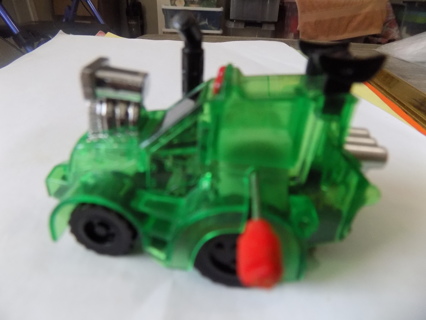 Z wind up green see thru truck engine bobs up & down pipe moves like periscope