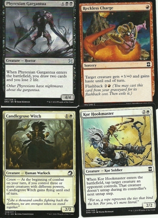 4 Magic the Gathering Cards: Phyrexian Gargantua, Reckless Charge & More