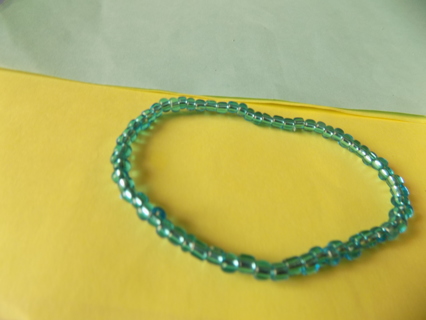 Bracelet E beads light  green/blue  transparent on stretchy cord